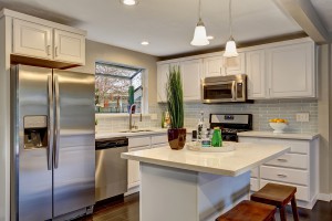 Nice kitchen in modern home including island and white counter tops. ** Note: Soft Focus at 100%, best at smaller sizes